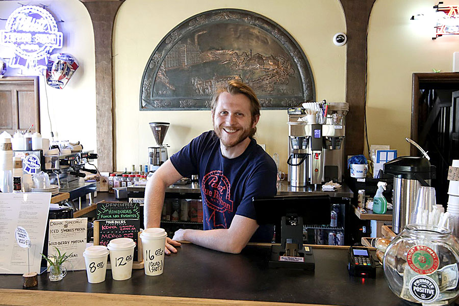 Cafe counter with barista